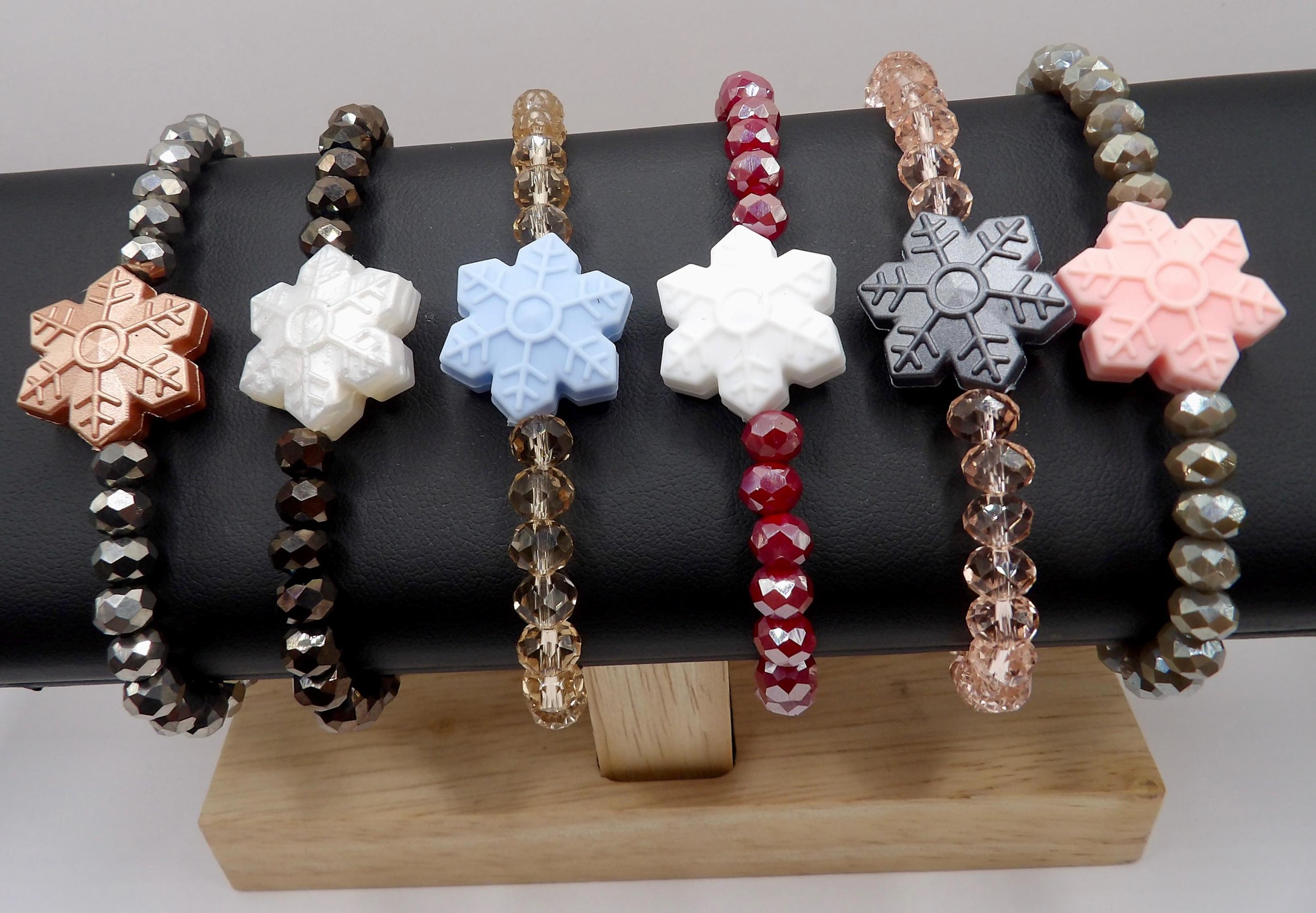 the winter sparkle bracelet demonstrating the contrast between the sharp facets of the glass and the smooth silicone.