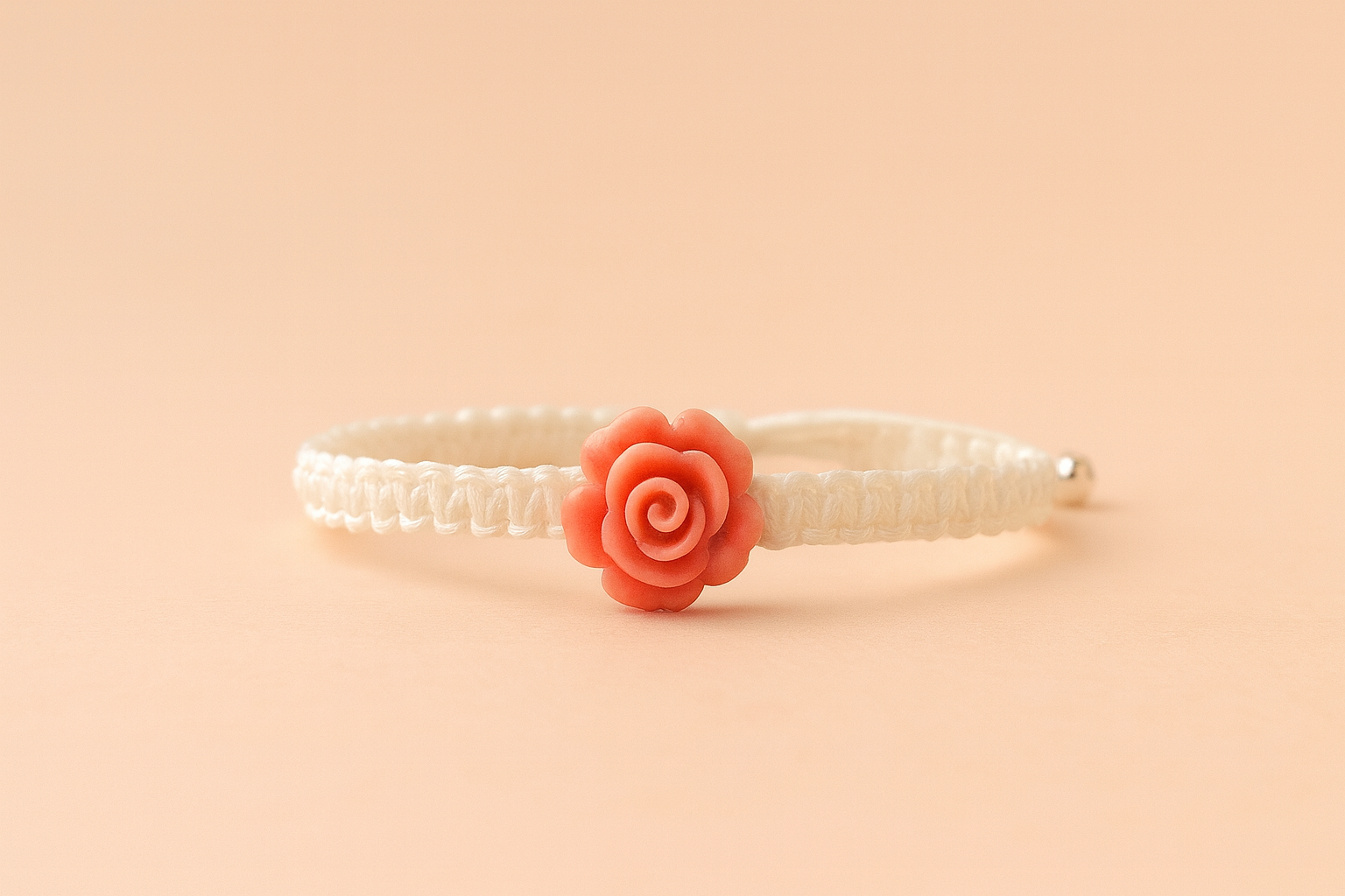 carved coral bracelet | coral jasper focal + white macramé overlay + sterling silver