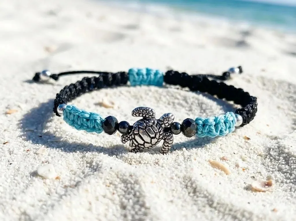 handcrafted waterproof anchor bracelet with a sterling silver turtle focal, designed for surf and beach lifestyles.