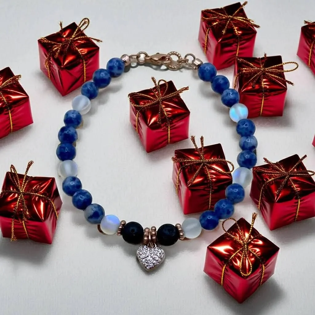an adjustable gold-filled anchor bracelet designed with a sophisticated cluster of light-catching blue gemstones.