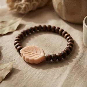 the peach leaf bracelet | silicone leaf focal + etched dark wood beads