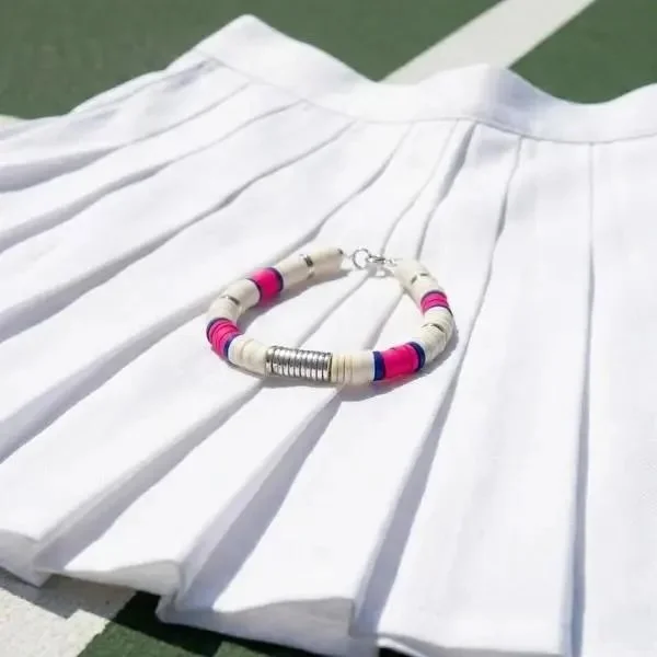 color-block heishi stack in navy and pink featuring metallic silver accents, designed for a modern 2026 preppy aesthetic.