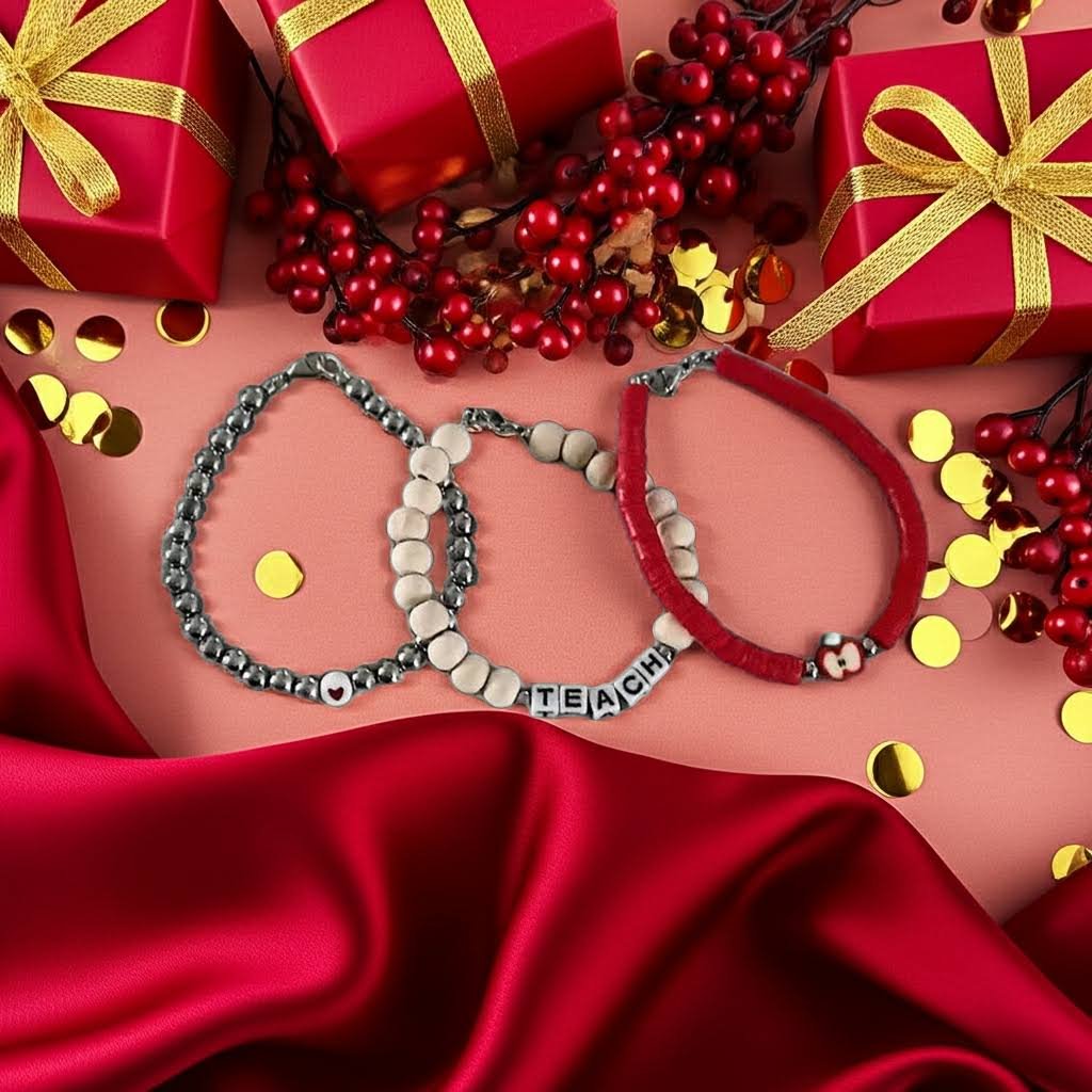 holiday gift photo of the 6mm glass teacher bracelet set shown with red berries & christmas presents, a perfect christmas gift for teachers.