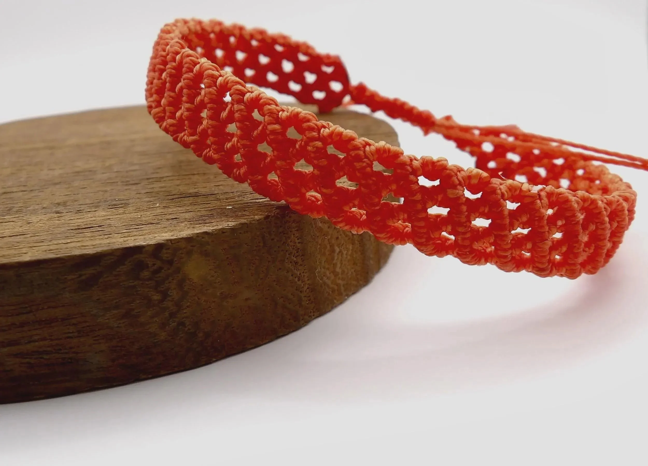 the layered weave bracelet styled for a "quiet luxury" aesthetic, emphasizing its clean lines and artisan craftsmanship.