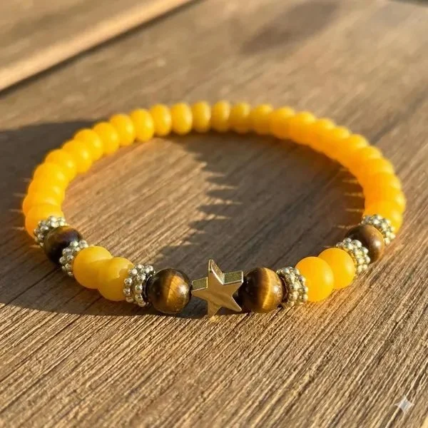 Butter yellow Tiger's Eye gemstone bracelet with 18k gold-plated star charms and smooth gold beads.