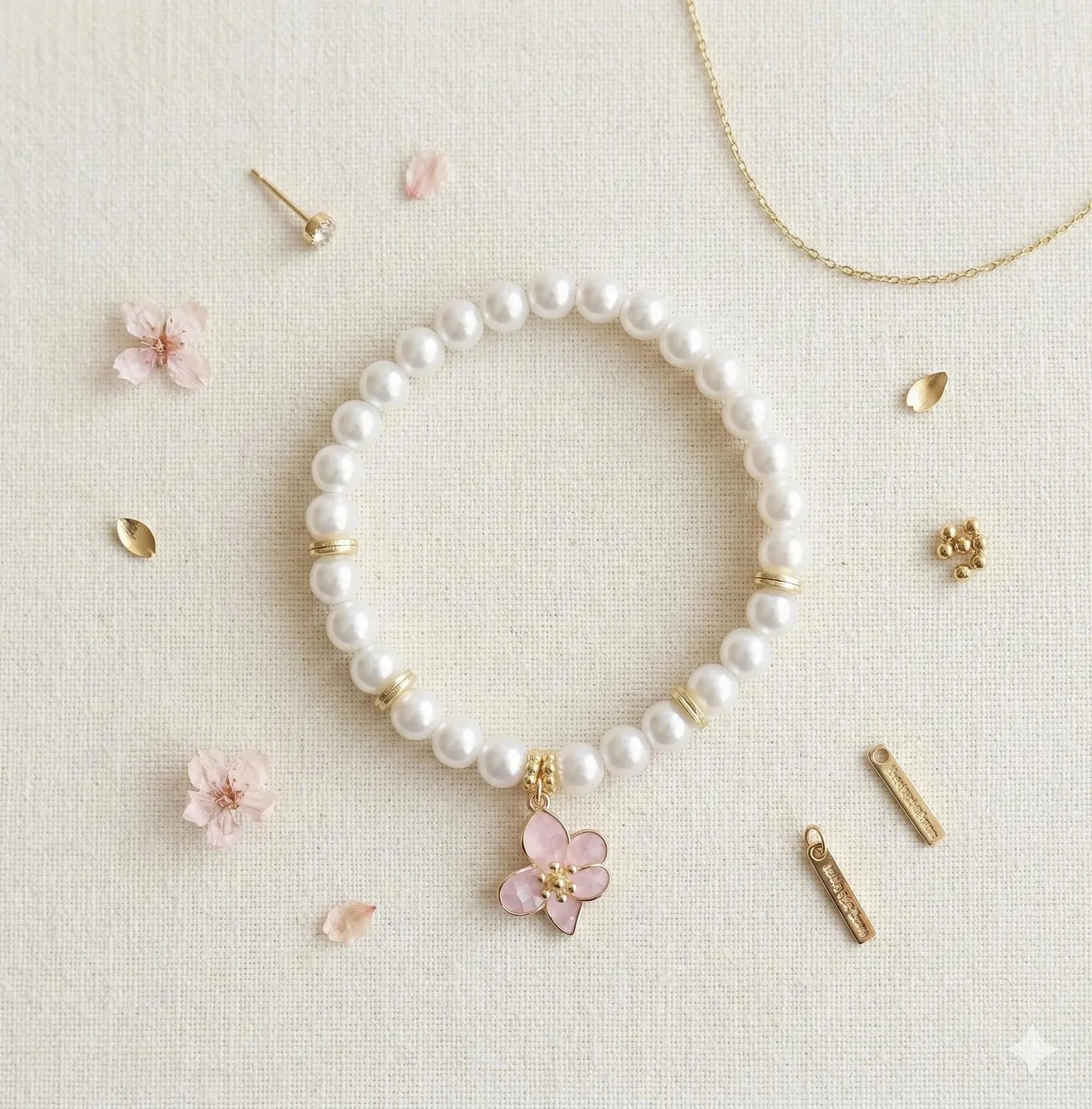 handcrafted coastal-luxe jewelry featuring tarnish-resistant 18k gold plating and genuine sea-born mother of pearl.