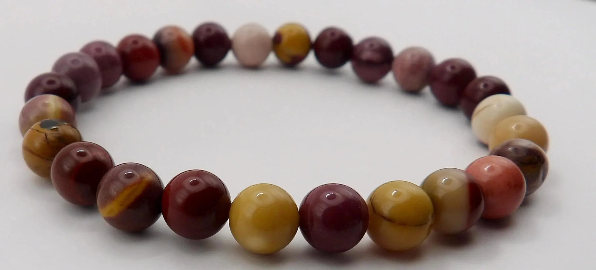 natural mookaite jasper beads on a durable stretch cord, capturing the warm desert-inspired aesthetic of the earthy wanderer.