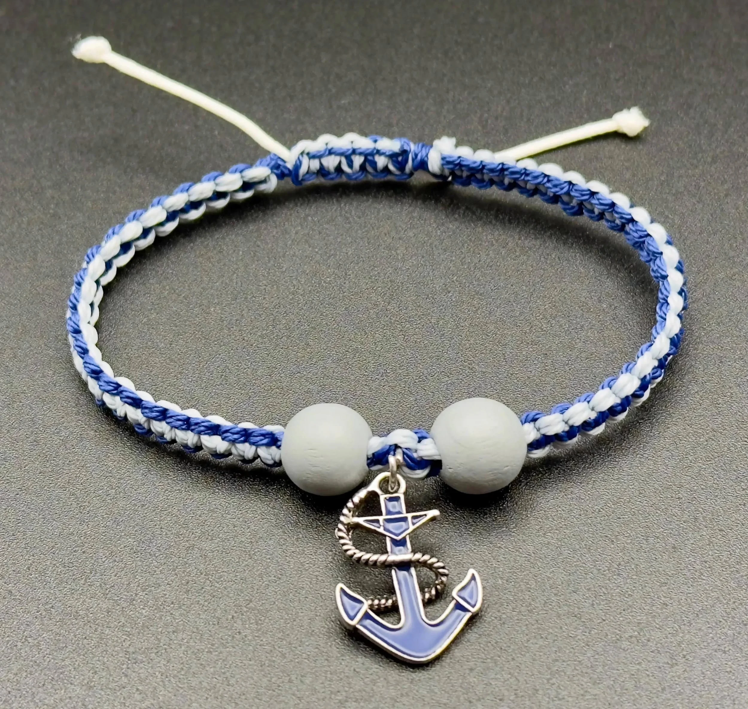 rugged nautical jewelry for men and women featuring ocean-inspired blue and gray cord with a sturdy anchor focal.