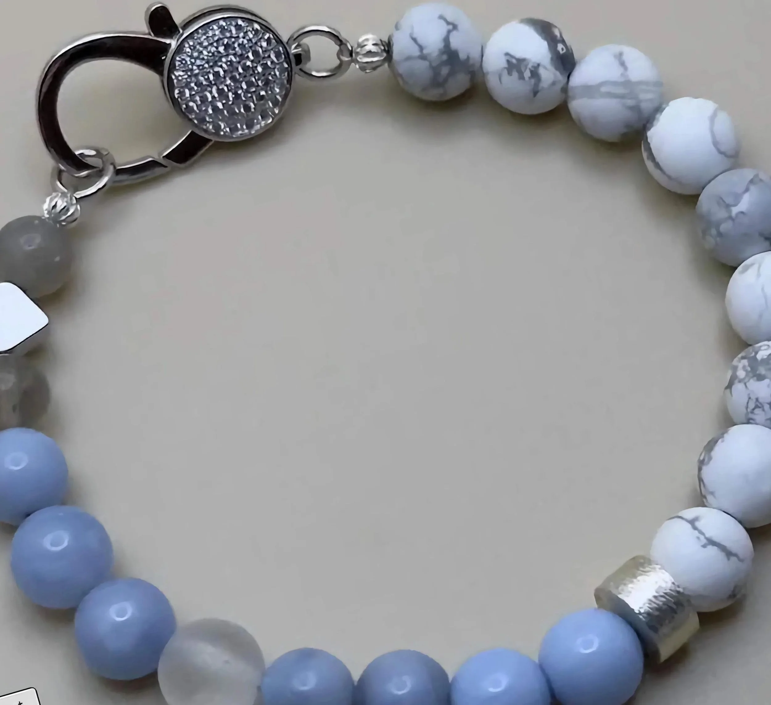 the pavé clasp statement bracelet styled as a wedding or formal event accessory, showcasing its "luxe-meets-nature" aesthetic.