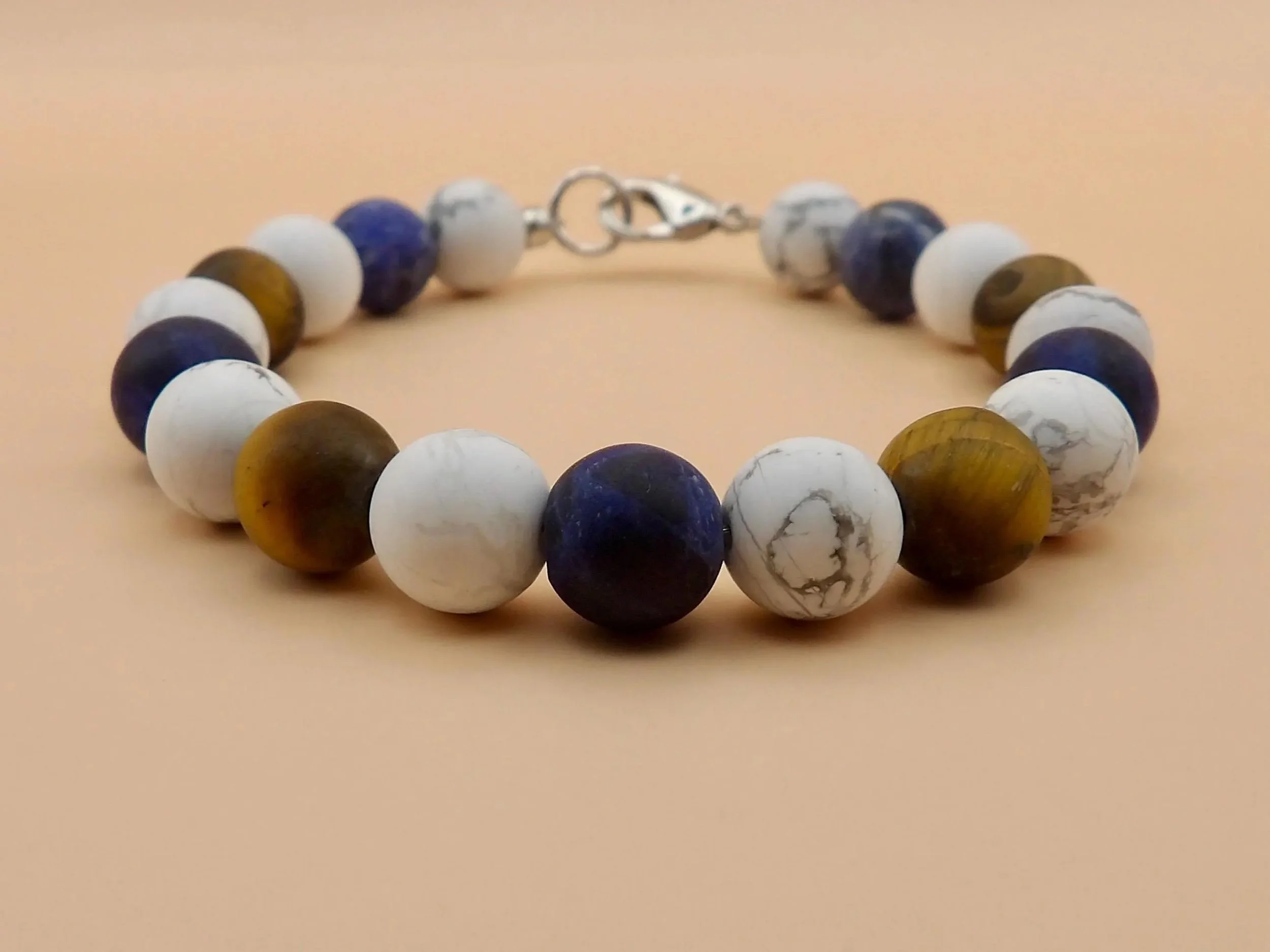 a versatile, waterproof gemstone anchor designed with a minimalist aesthetic and industrial-strength stainless steel.