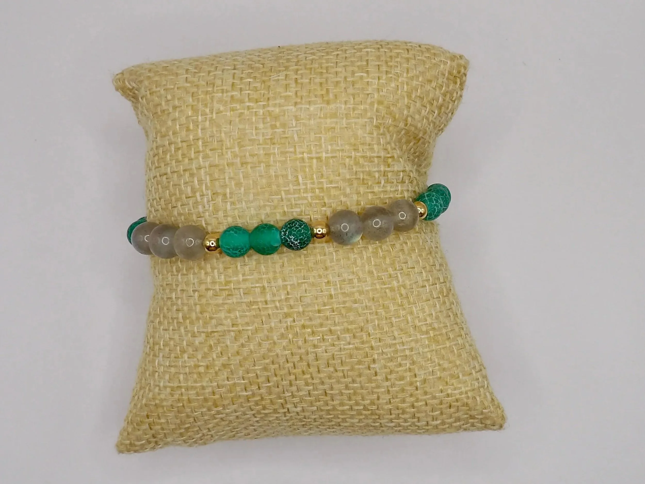 an intentional gemstone anchor piece featuring the calming energy of green agate and the protective qualities of labradorite.