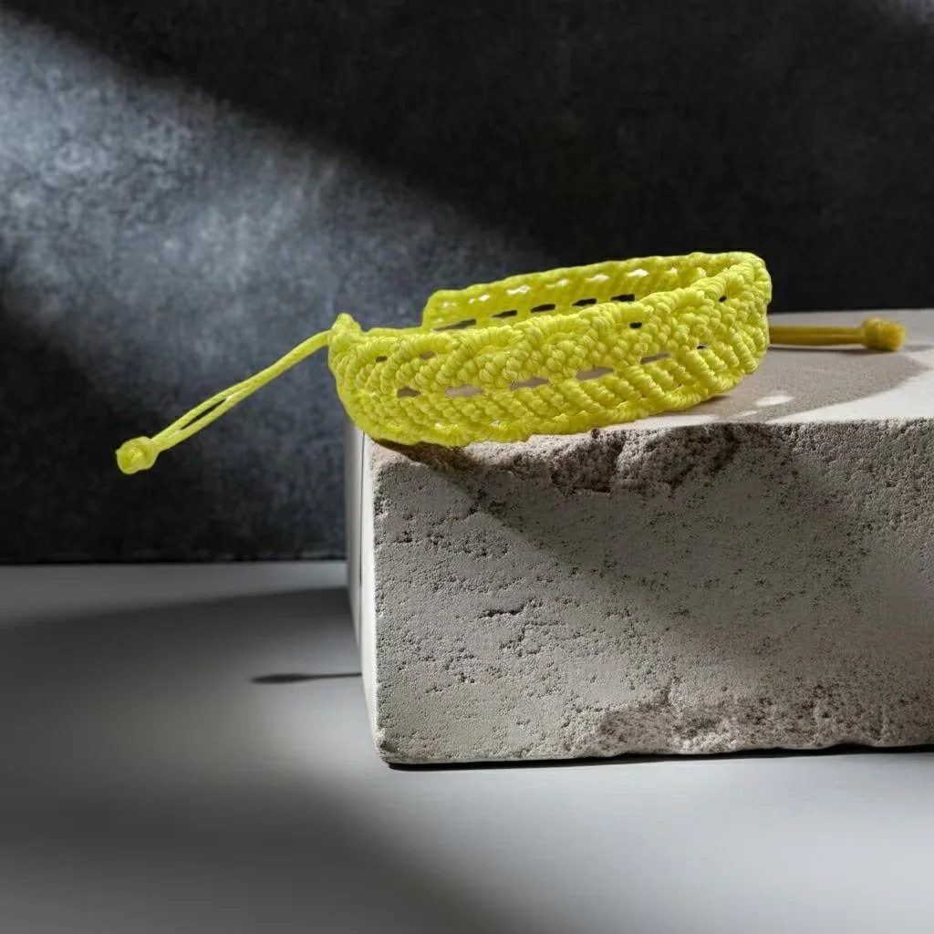 a durable and waterproof "adventure-ready" friendship bracelet showing the traditional chevron weave and adjustable sliding knot.