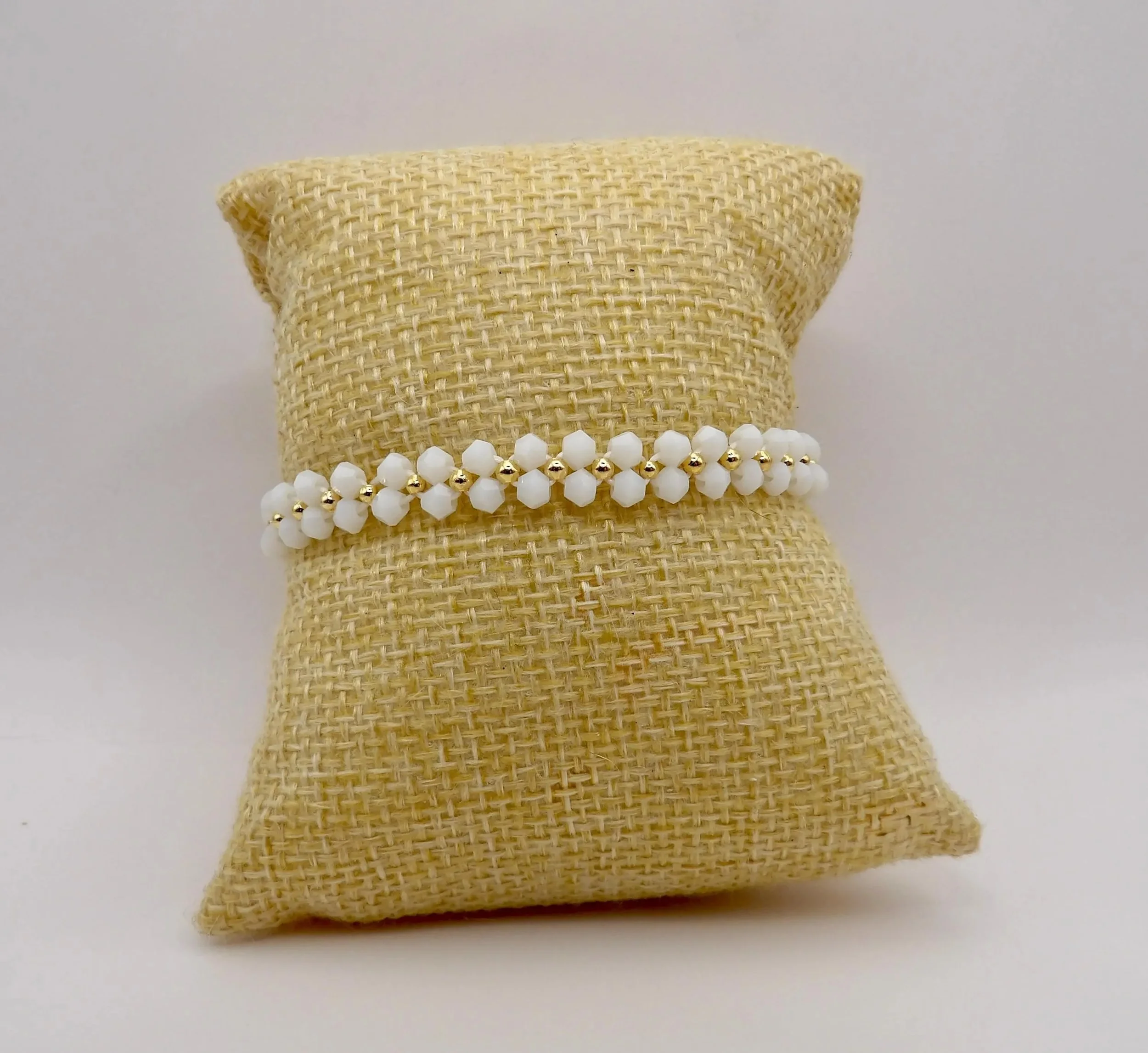 White and gold floral crystal bracelet designed for a romantic, "clean girl" aesthetic with premium gold-plated hardware.