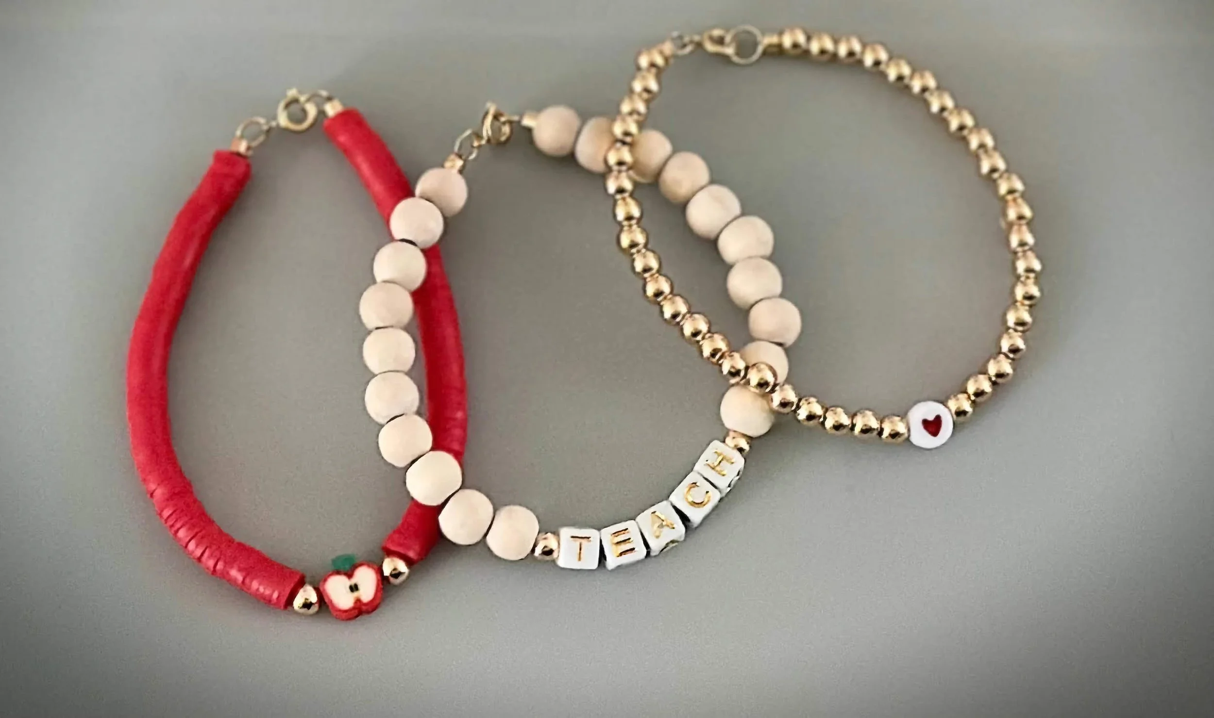 handmade gold & red “teach” stacked bracelets-5mm -edited2.png