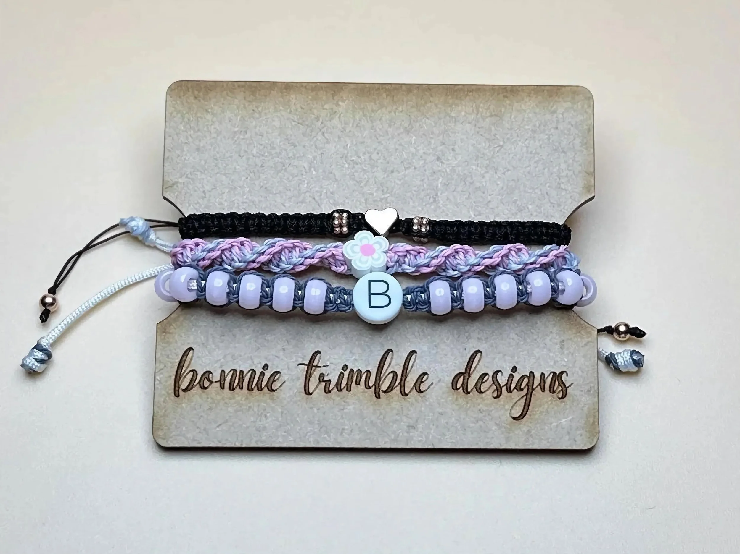 feminine and sentimental 3-piece anchor set combining a custom letter charm with a dainty rose gold heart.