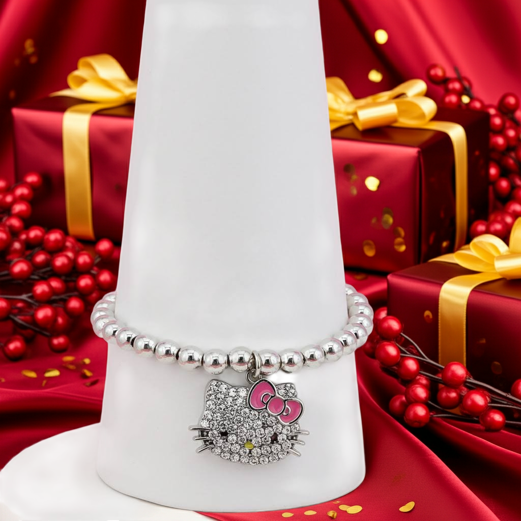 holiday gift photo of the hello kitty pave crystal charm bracelet shown in a stocking, a perfect christmas stocking stuffer.