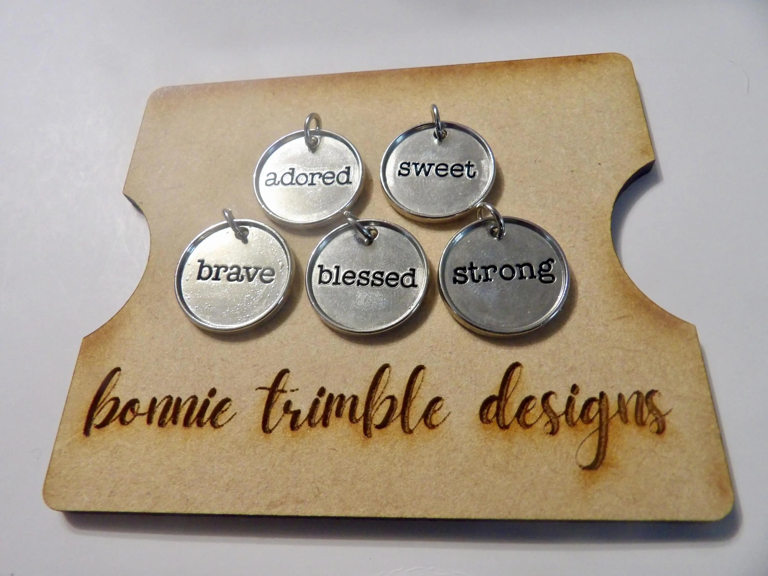 matte sea-foam amazonite jewelry showing the natural stone variations and a polished silver charm focal point.