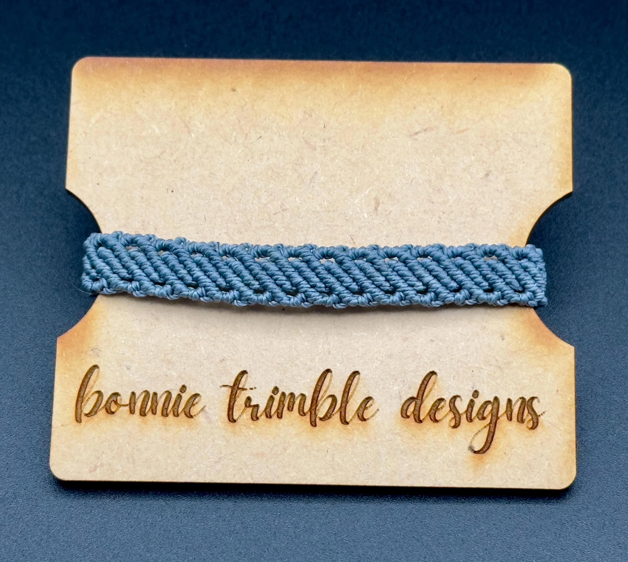 close-up of the practical stylist bracelet highlighting the intricate texture of the layered hand-knotted threads.