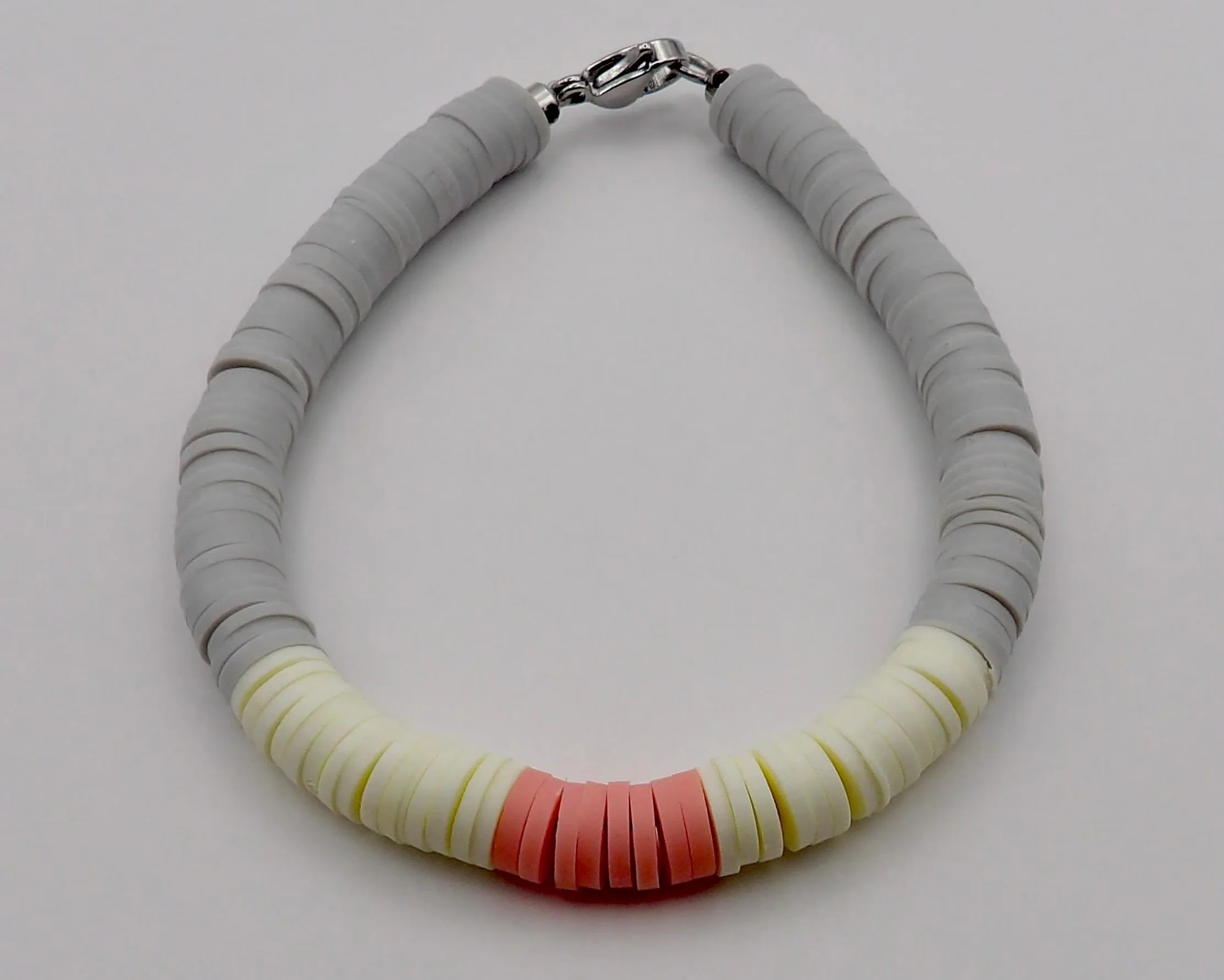 handcrafted color-block bracelet with a durable 304 stainless steel hardware finish for a modern, curated look.