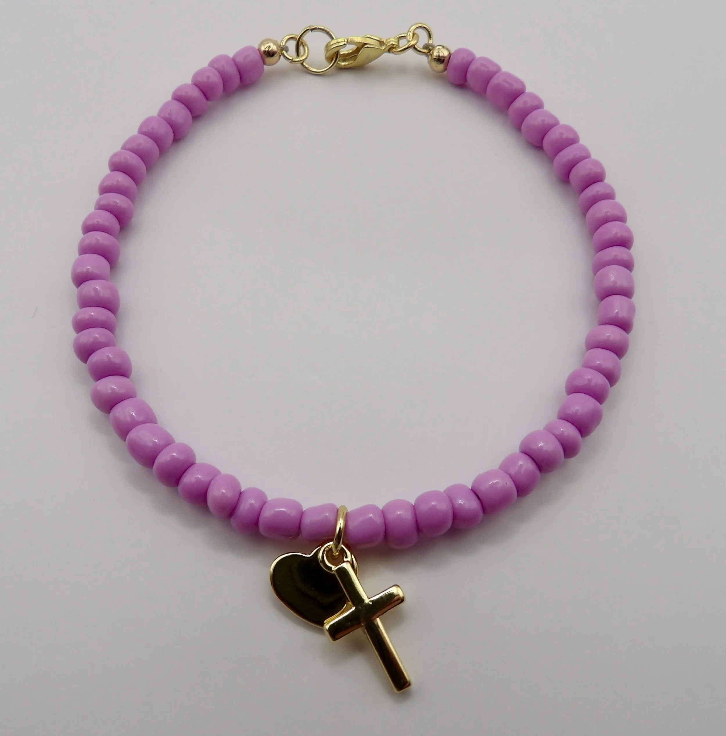 color chart showing available glass seed bead colors for the custom 18k gold charm bracelet.