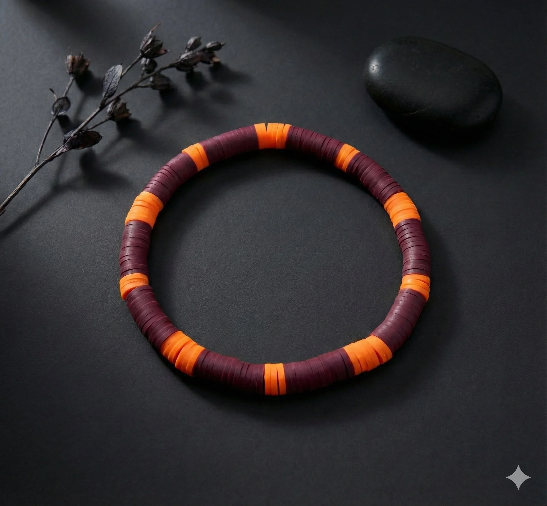 Plum noir and orange color block heishi bracelet with vibrant stacked beads.