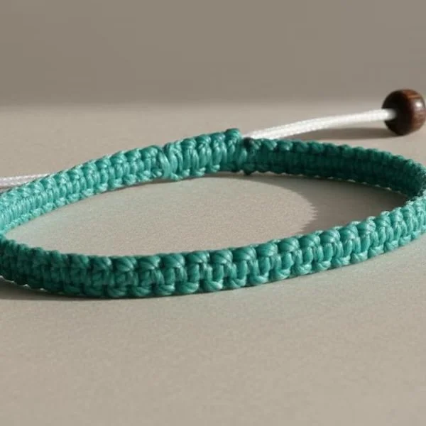 the classic macramé bracelet | single‑color adjustable cord + etched wood beads