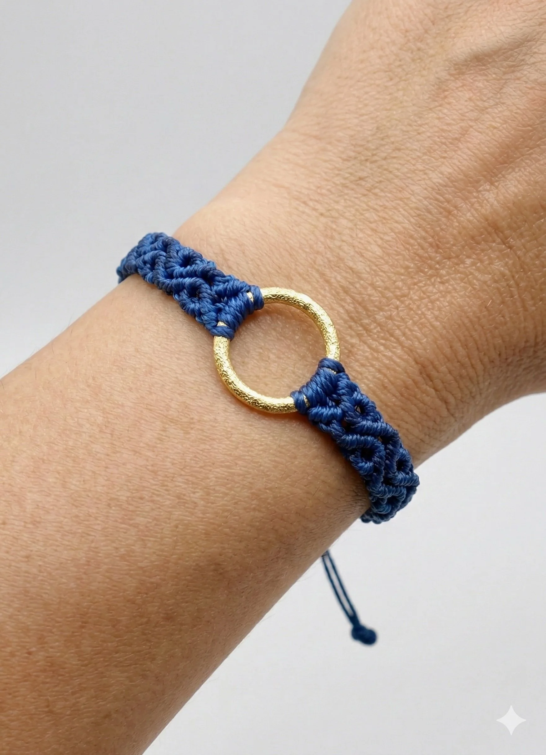 the navy moonrise bracelet | navy micro‑macramé with brushed 18k gold overlay disc