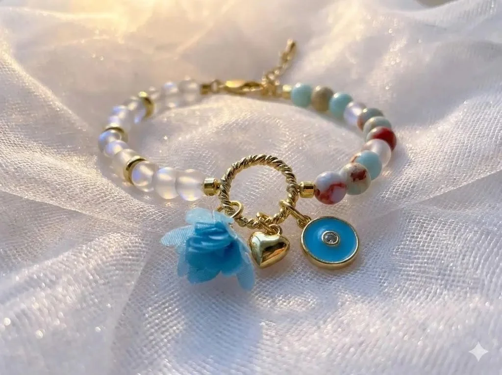 a celestial-inspired jewelry piece showing the iridescent play-of-color in the blue opal and the metallic labradorescence of the spectrolite.