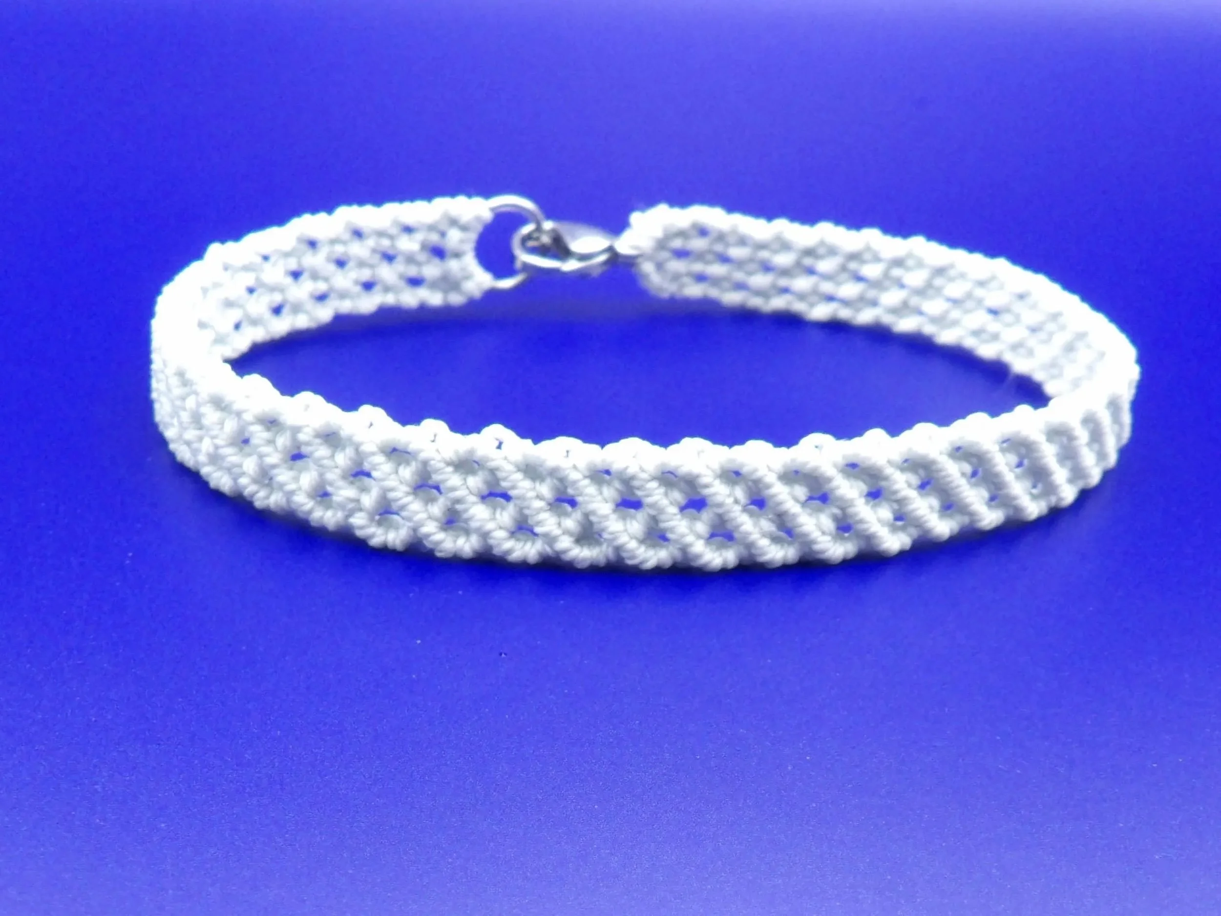 a versatile and lightweight gray stacking bracelet designed for the modern professional with a "stealth-wealth" style.