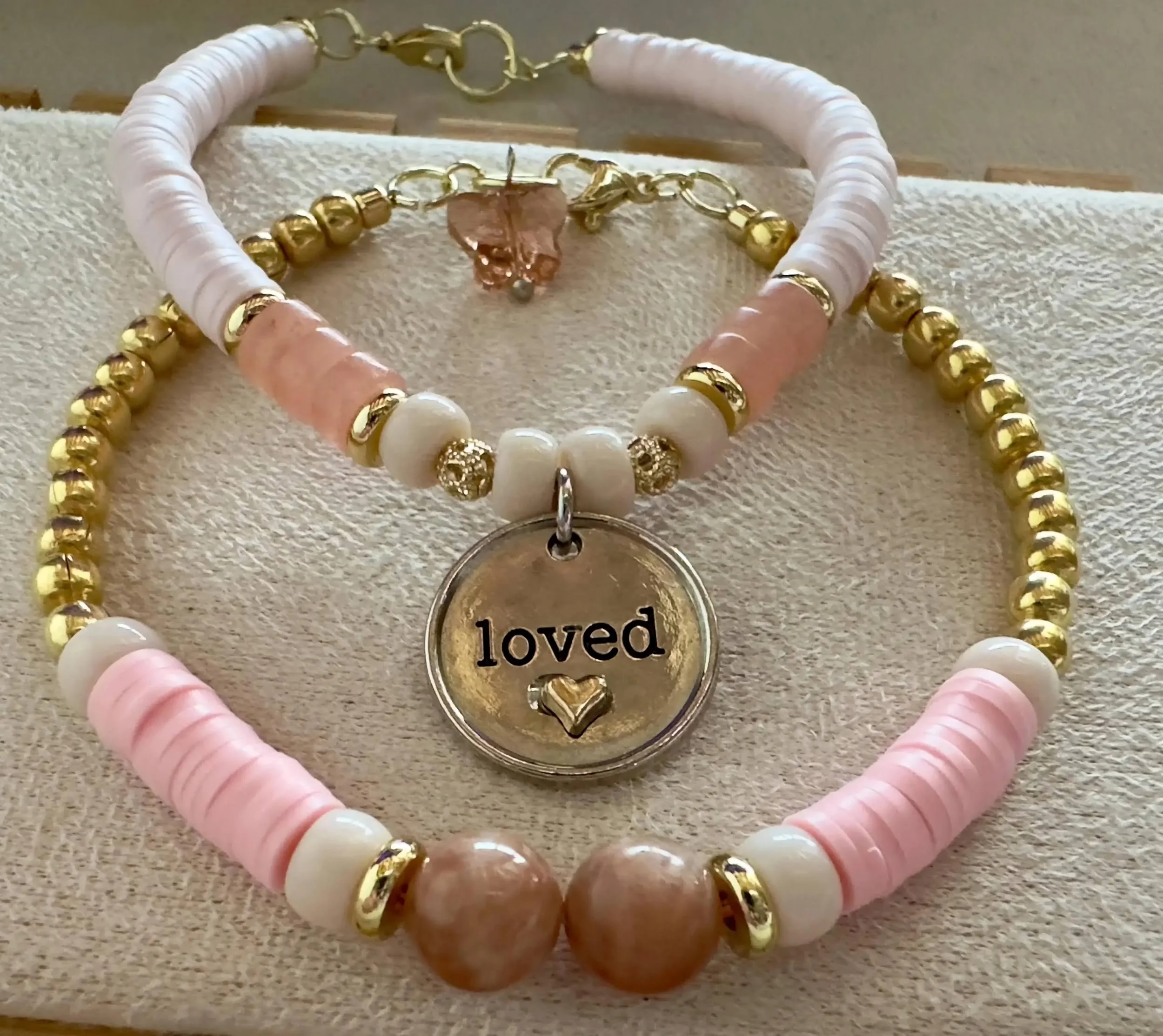 handmade sunstone, moonstone, and rose quartz beaded bracelet duo with "loved" engraved disc charm.