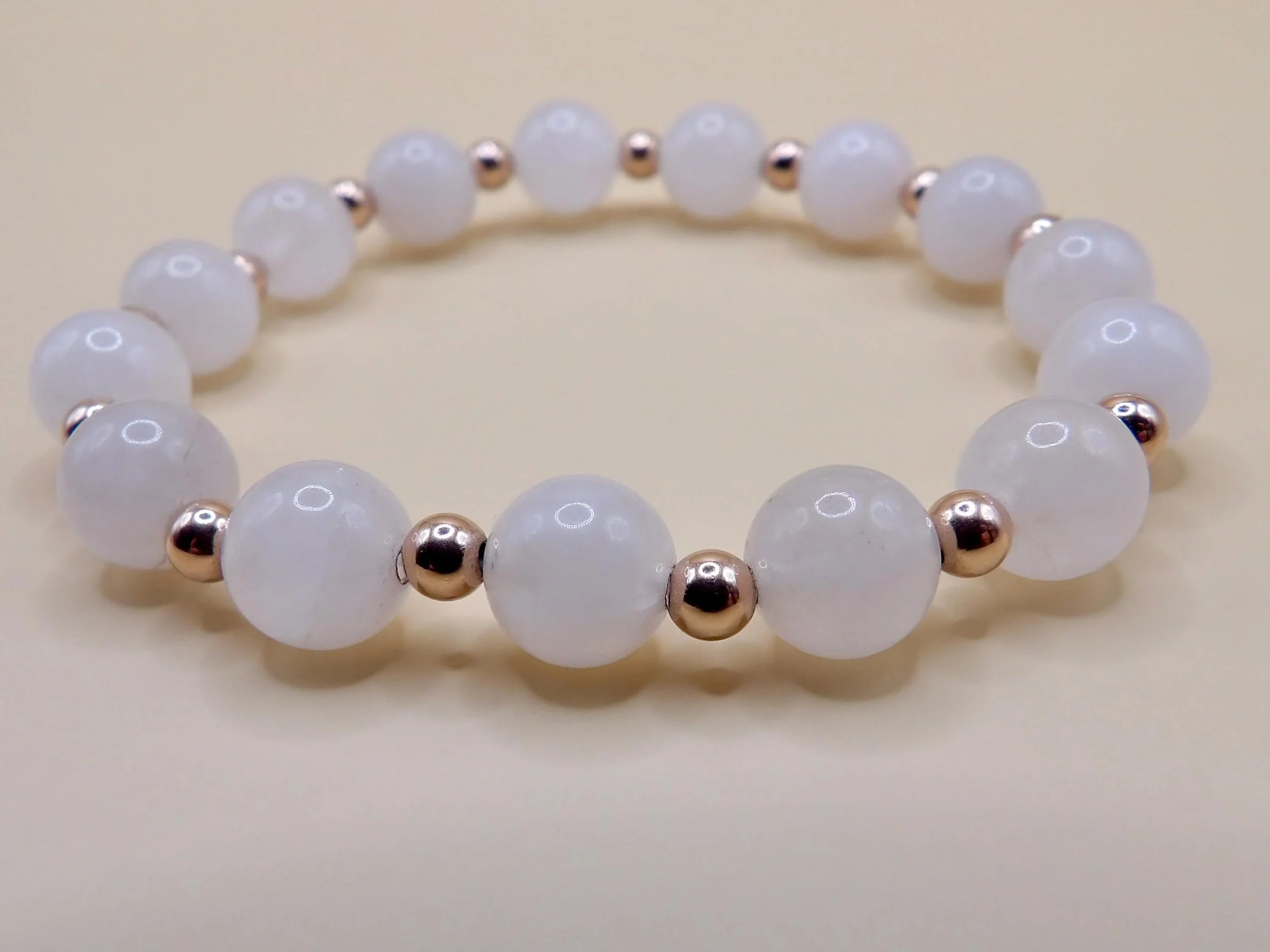the blushing romantic set styled on a floral background to emphasize its feminine, soft aesthetic and rose gold finish.
