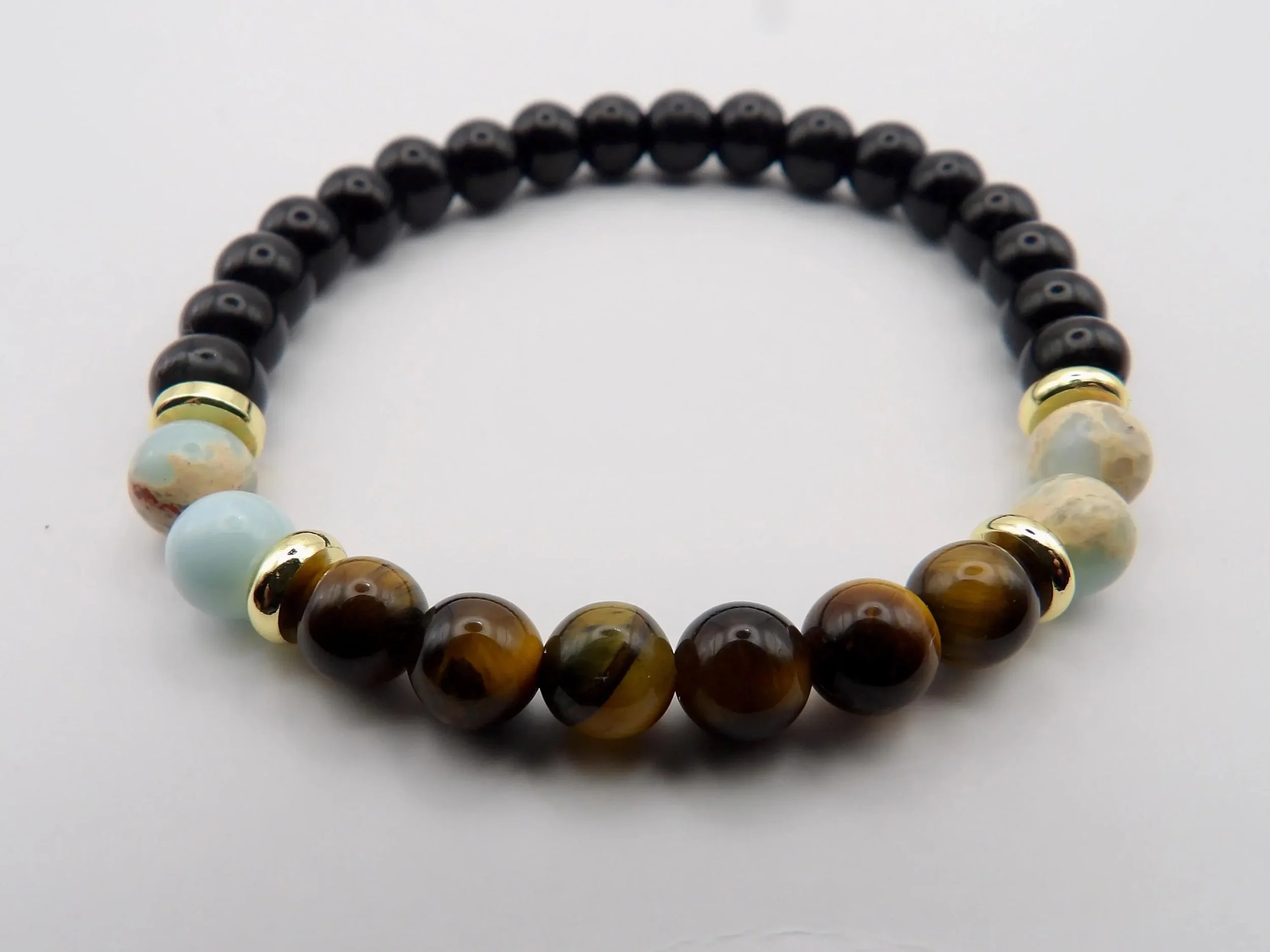 handcrafted luxury stretch jewelry with 18k gold plated heishi spacers and a trio of earthy natural gemstones.