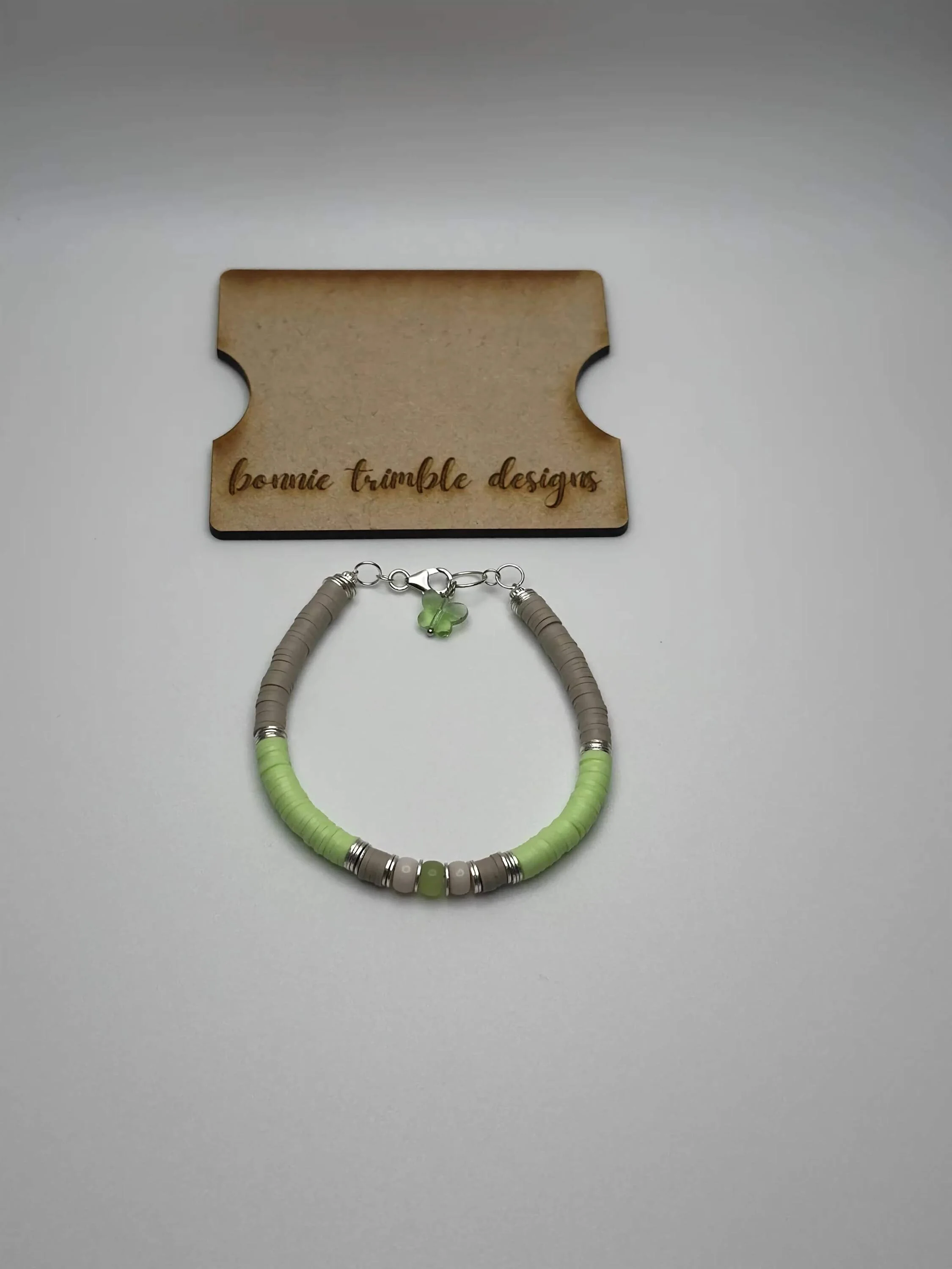 a versatile custom anchor bracelet for women featuring natural silver hardware and a personalized color story.
