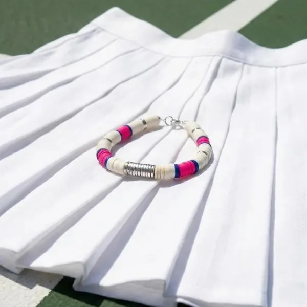 preppy hot pink and navy blue heishi bead bracelet with silver hematite accents.