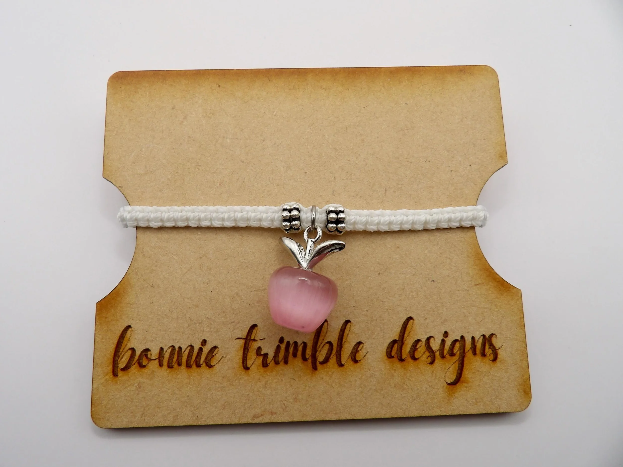 Waterproof pink teacher jewelry with stainless steel accents, built for daily wear and easy maintenance by busy educators.