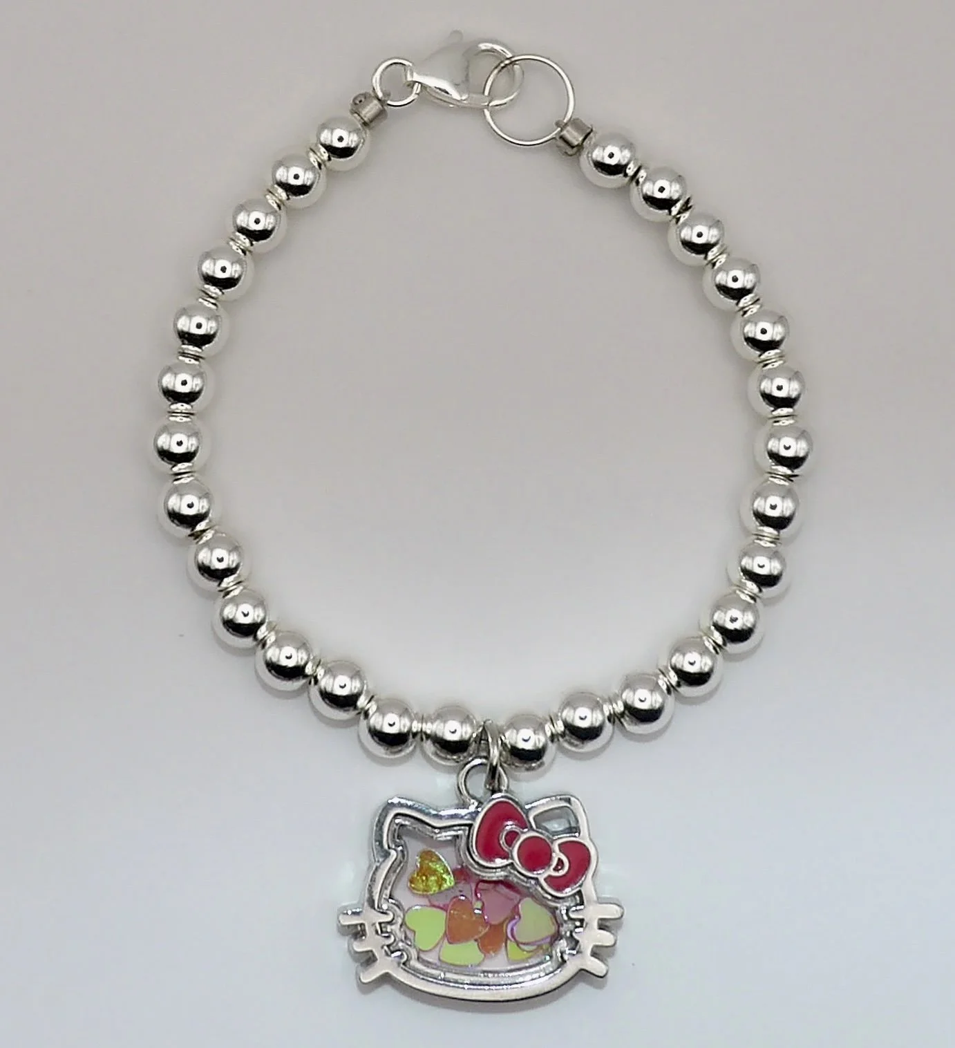 handmade 925 sterling silver beaded bracelet w/ a hello kitty shaker charm