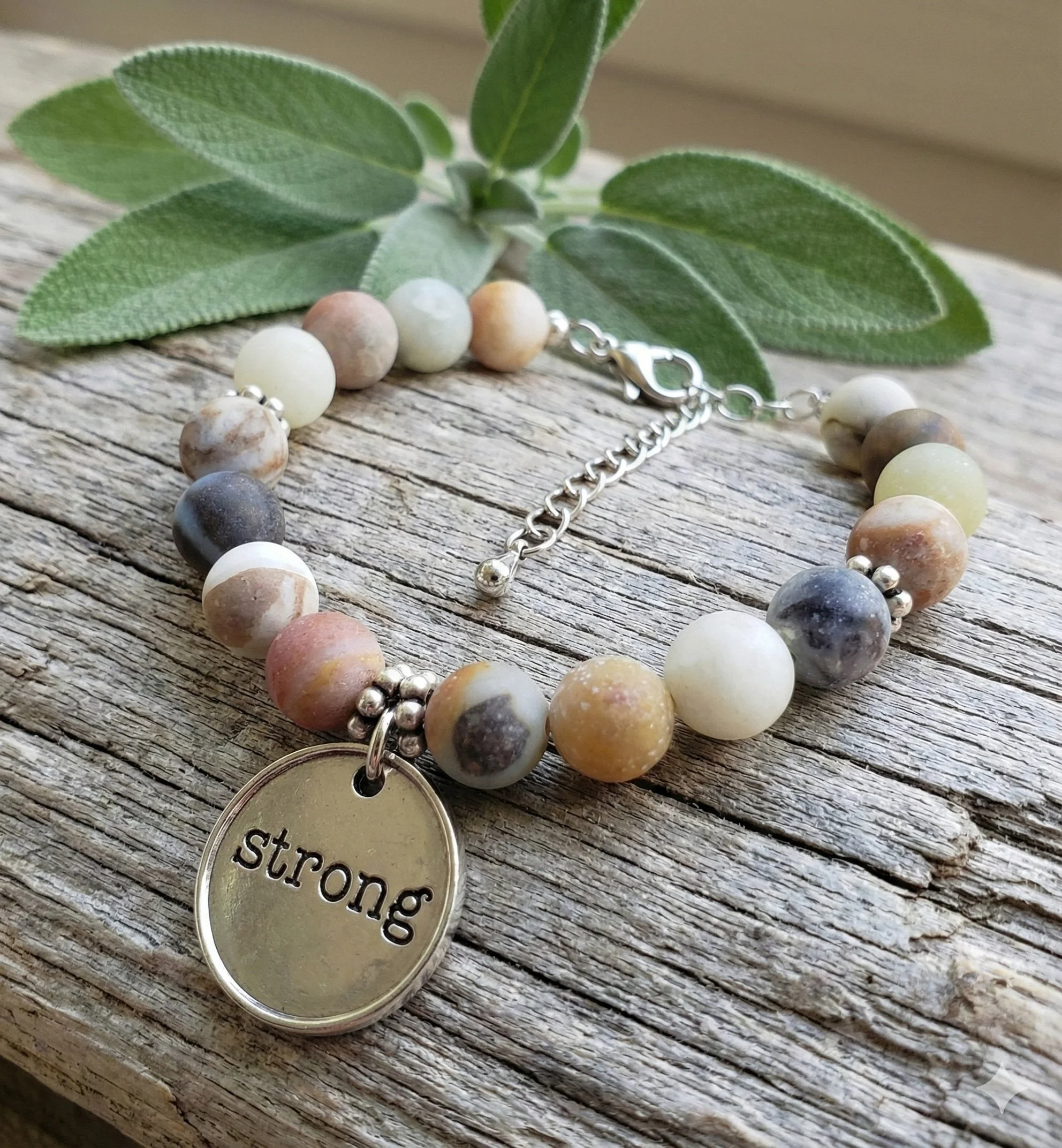 matte amazonite beaded bracelet with an inspirational "strong" word charm.