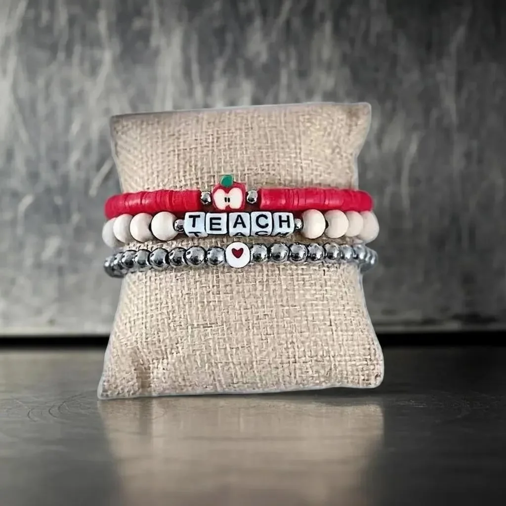 fun teacher appreciation jewelry set with a whimsical mix of materials and a bright red apple focal bead.