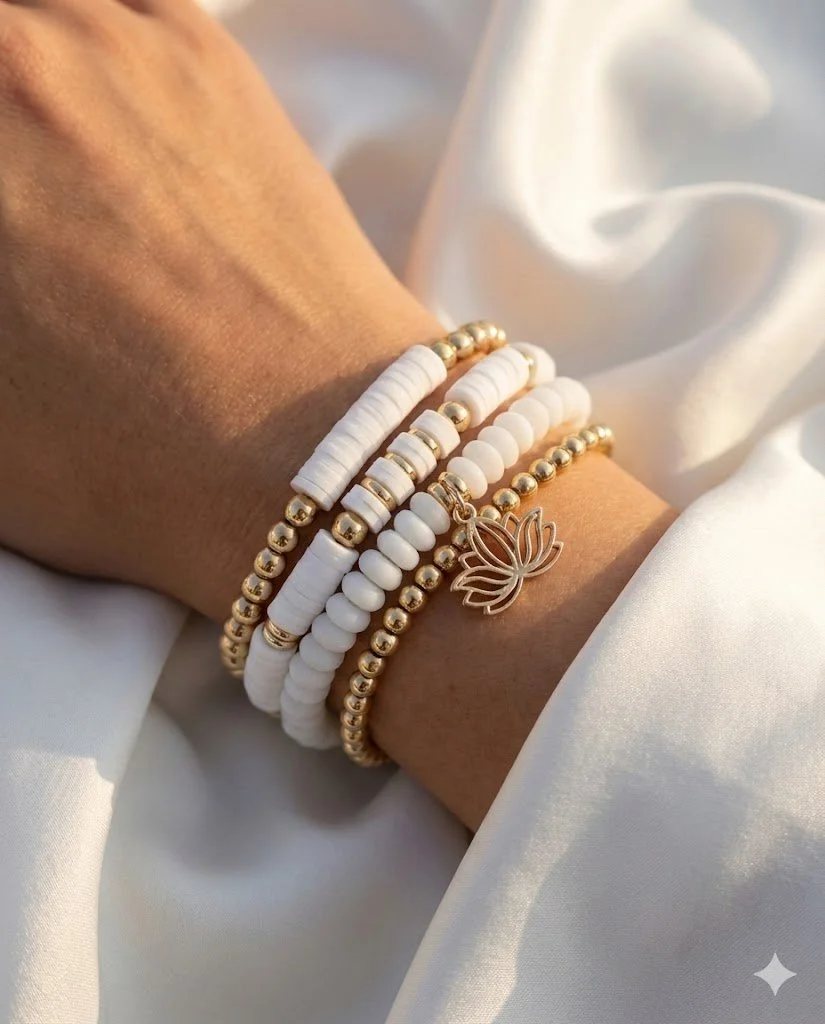 handmade 3-piece luxury bracelet stack featuring 18k solid gold beads, white heishi, matte glass, and a gold lotus charm. serene spiritual jewelry gift.