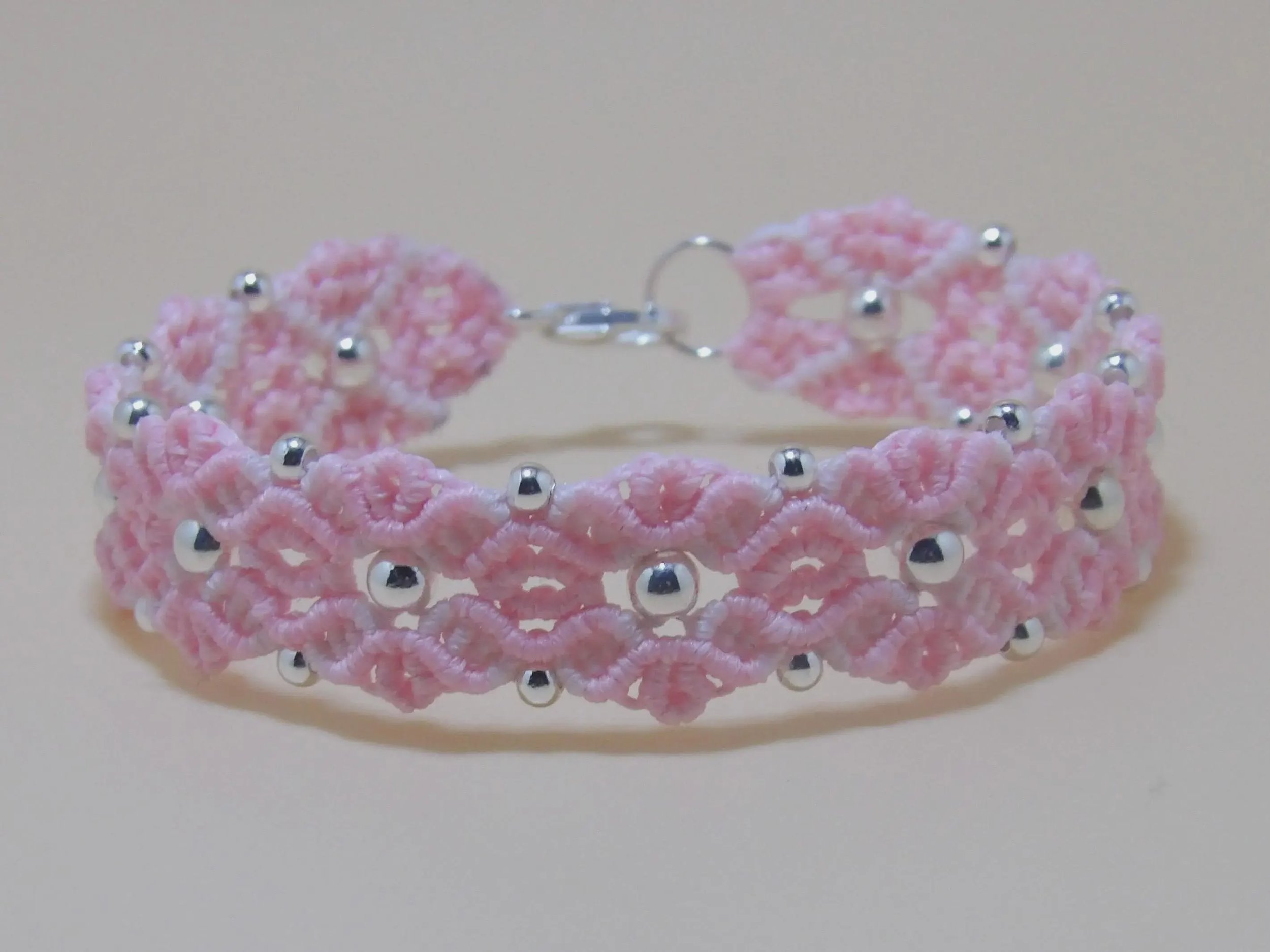 a dainty yet durable micro-macramé flower bracelet designed for daily wear and sentimental gifting.