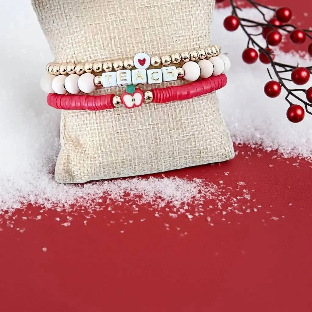 sentimental educator jewelry set in a 5mm gold bead style with a classic red apple focal bead and gold-tone "teach" typography.