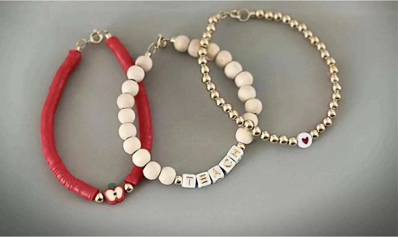 close-up of a 3-piece 5mm 18k gold plated stretch bracelet stack designed for comfortable daily wear by teachers and professionals.