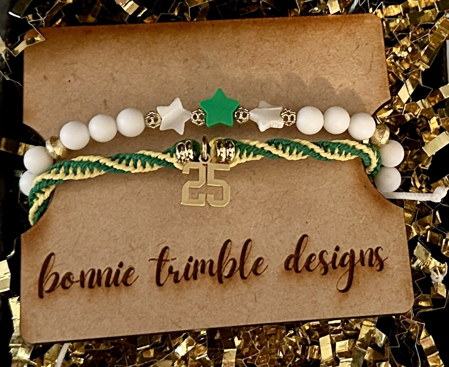 personal wearing the adjustable custom number macrame bracelet showing school spirit colors. perfect personalized graduation or team gift.