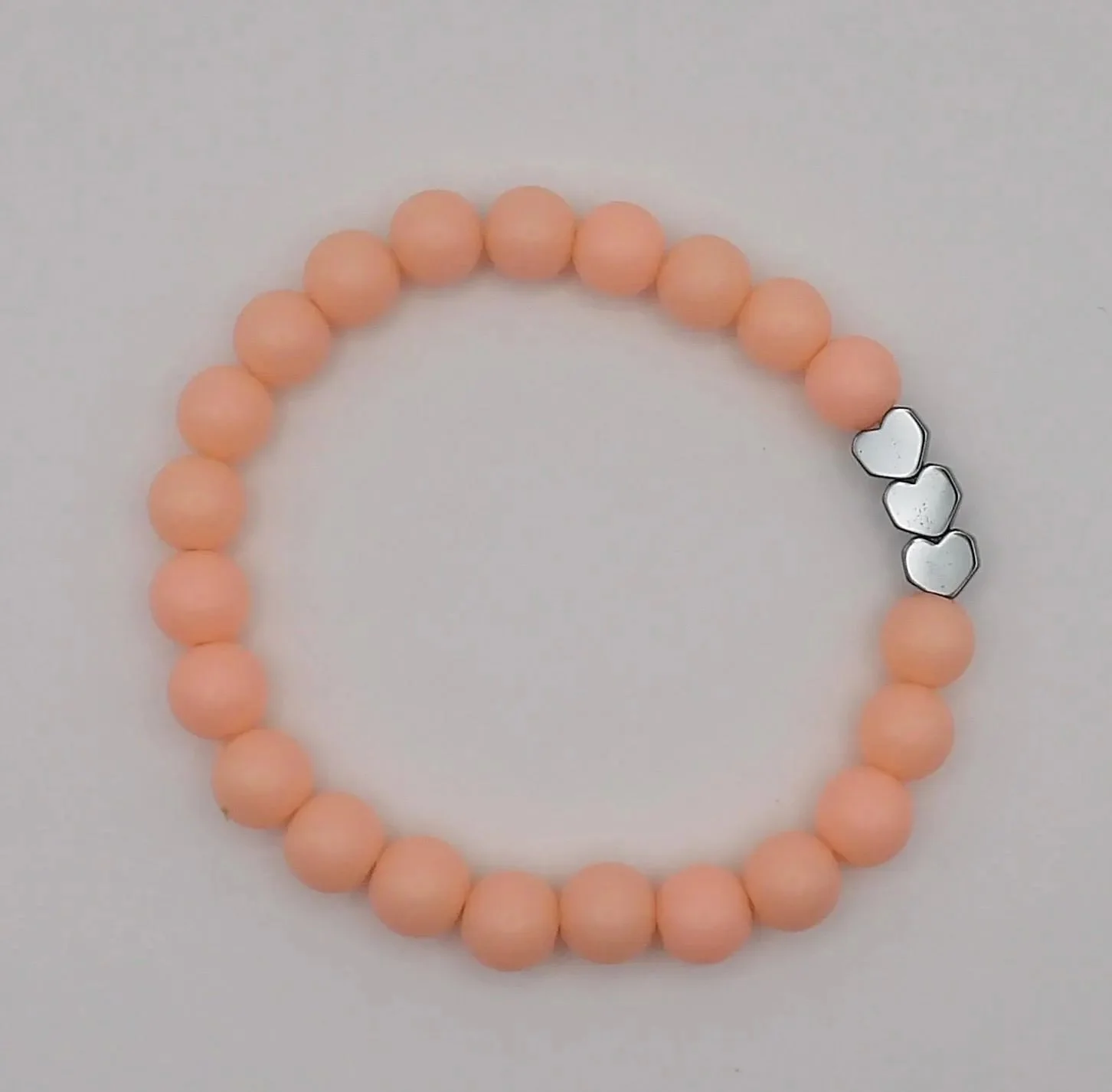 the playful dreamer bracelet showcasing its durable stretch construction and soft-touch, high-quality bead finish.