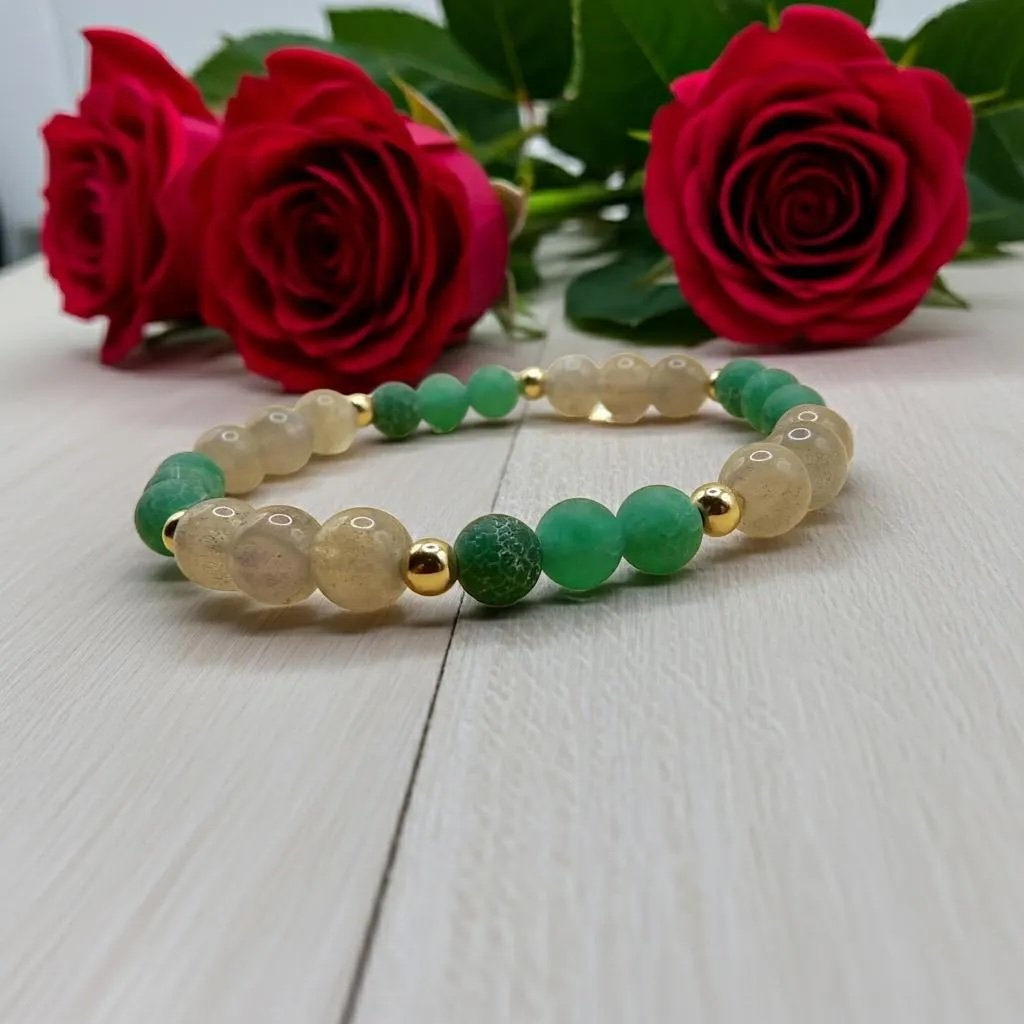 close-up of the earthy mystic bracelet highlighting the high-quality gold-filled hardware and the iridescent labradorescence of the stones.