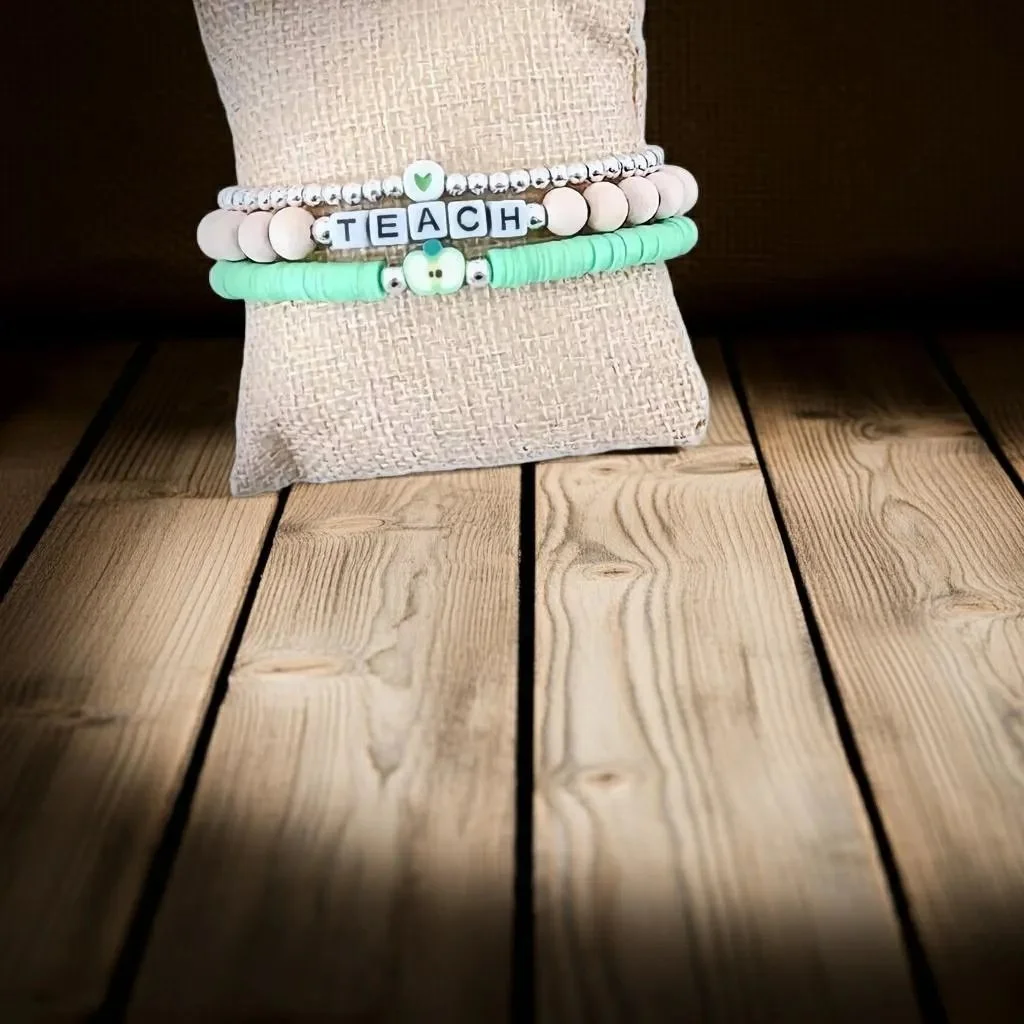 meaningful teacher gift featuring a 3-piece 3mm silver bead bracelet set with "teach" message beads.