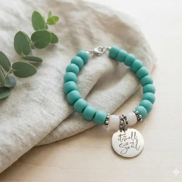 the well with my soul bracelet | stainless steel engraved charm | cream + teal 6×8mm beads | oxidized silver daisy spacers