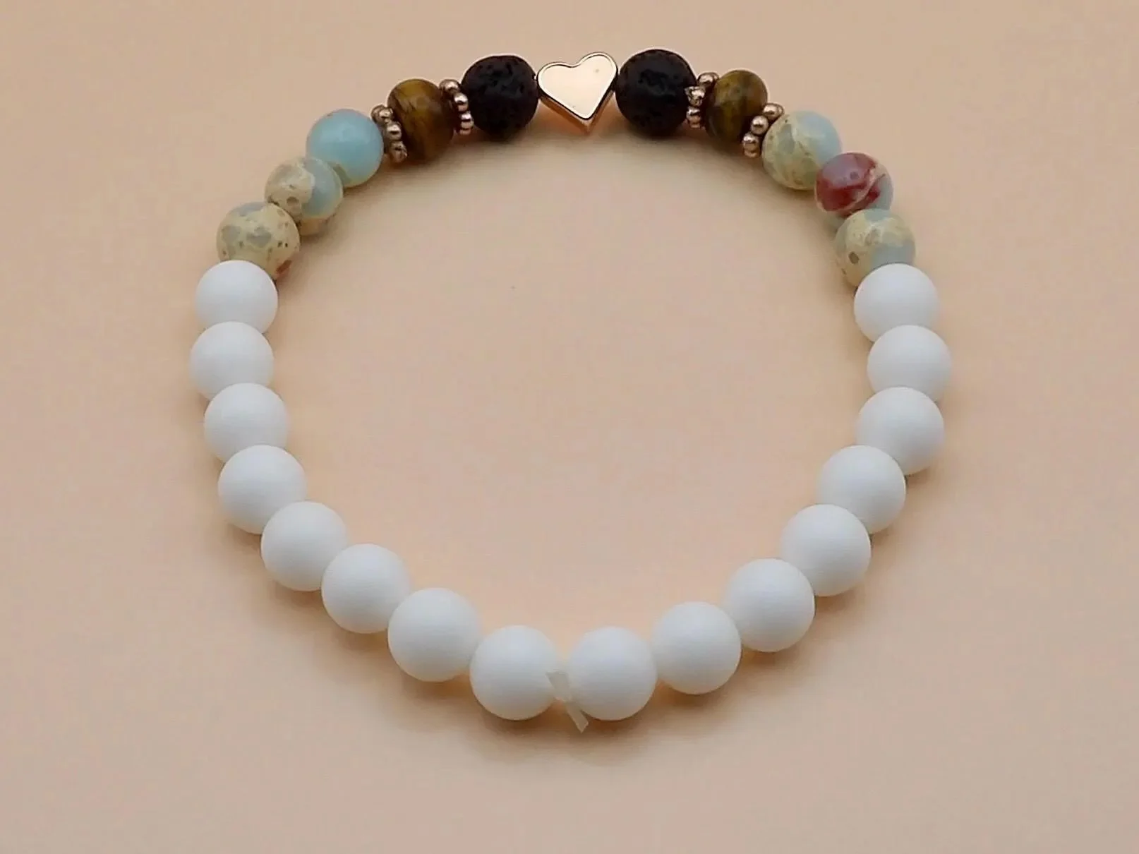 the grounded glam bracelet styled for the 2026 "intentional wellness" trend, emphasizing its role as a wearable diffuser.