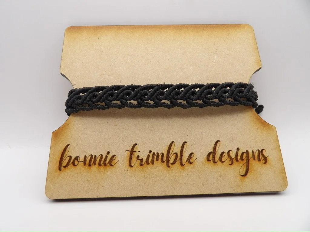 collage showing the handmade scrollwork micro macrame bracelet in multiple colors, like black, red, and green.