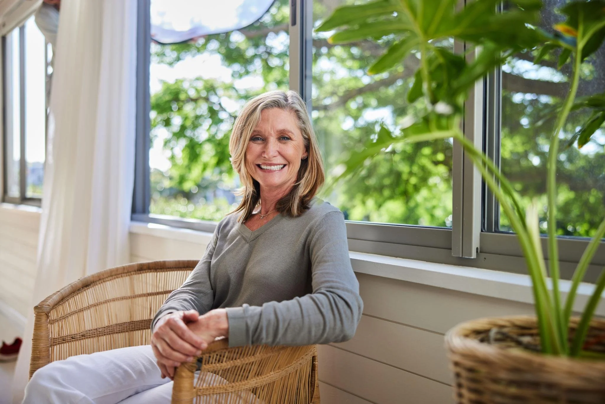 Woman feeling better after menopause care for joint pain.
